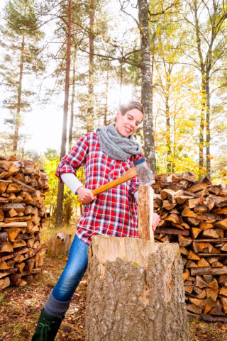Woman chopping wood